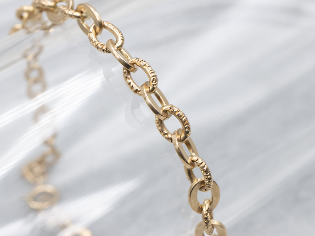 Flat and Textured Gold Oval-Link Bracelet