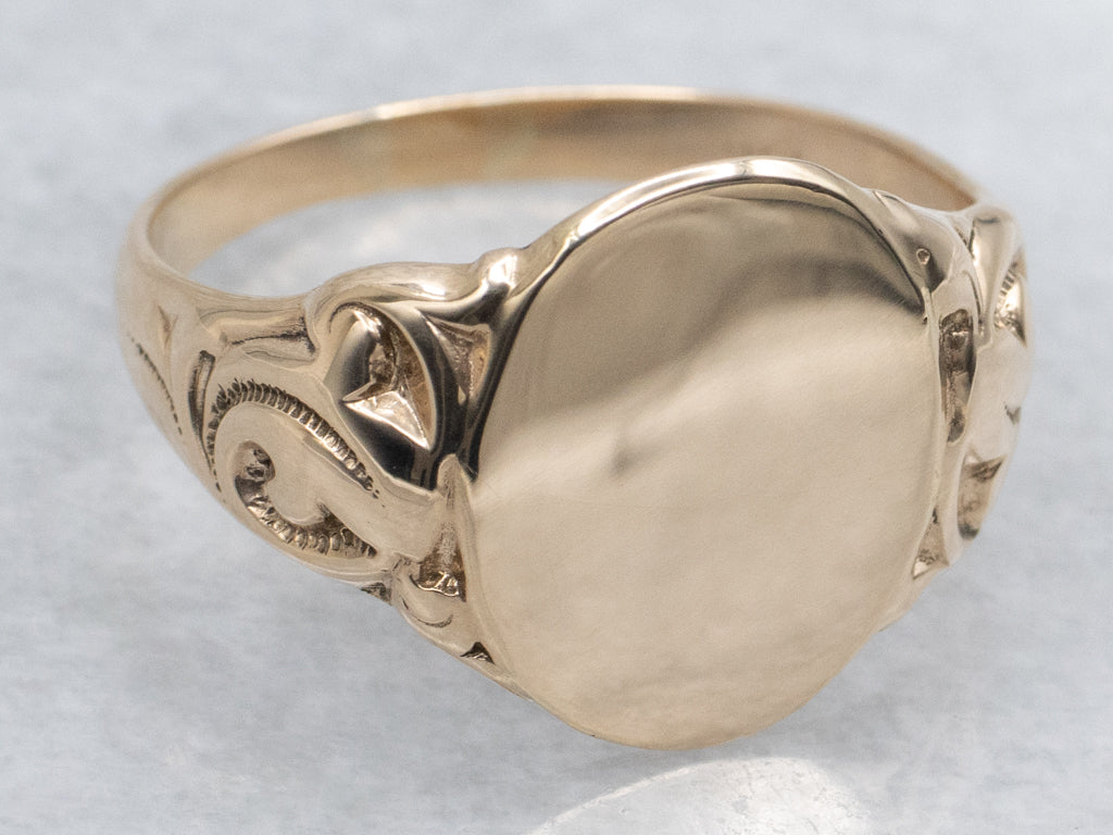 Men's Oval Top Signet Ring with Flourish Shoulders