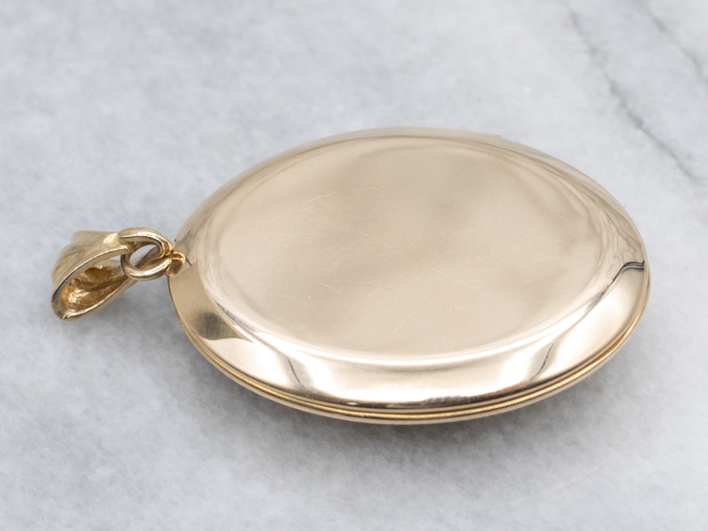 Vintage Gold Sapphire Tufted Pattern Oval-Shaped Locket