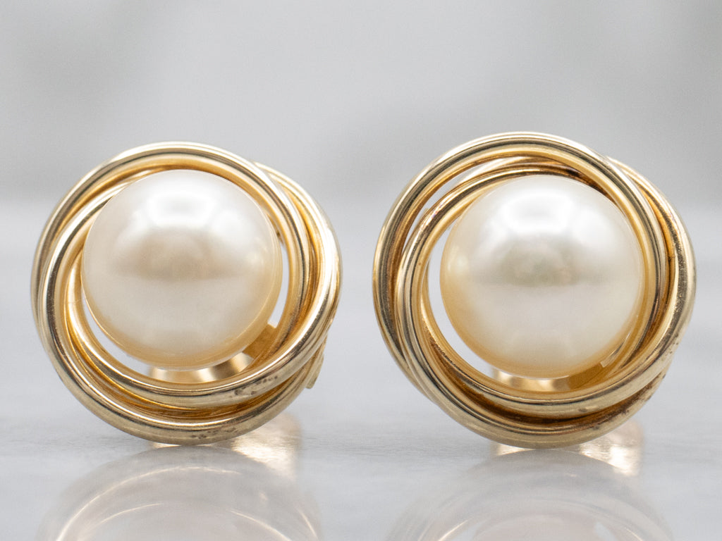 Twisting Yellow Gold Pearl Stud Earrings