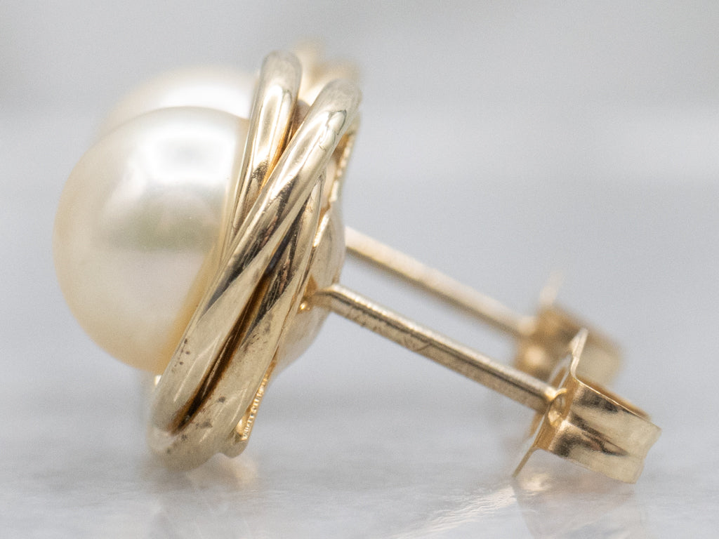 Twisting Yellow Gold Pearl Stud Earrings