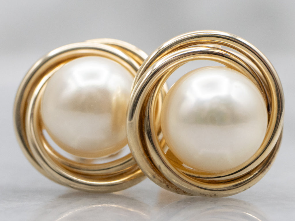 Twisting Yellow Gold Pearl Stud Earrings