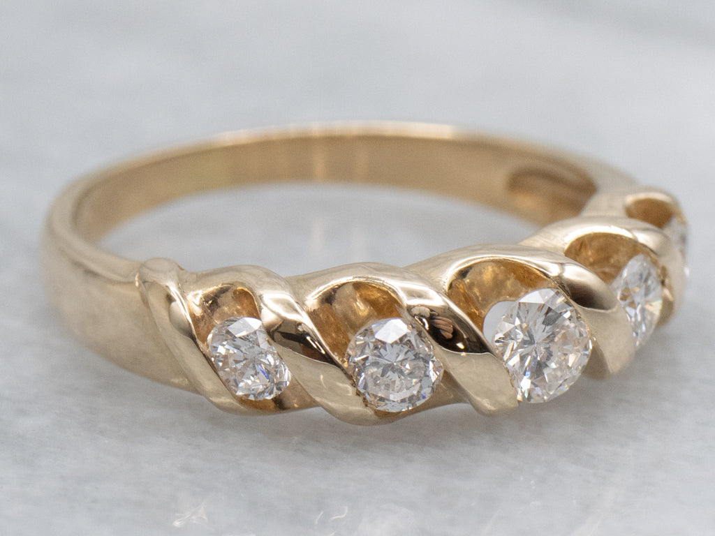Twisting Gold Graduated Diamond Band