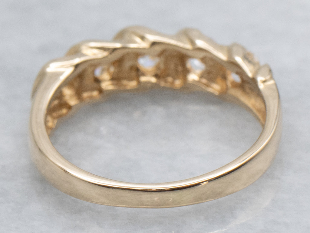 Twisting Gold Graduated Diamond Band
