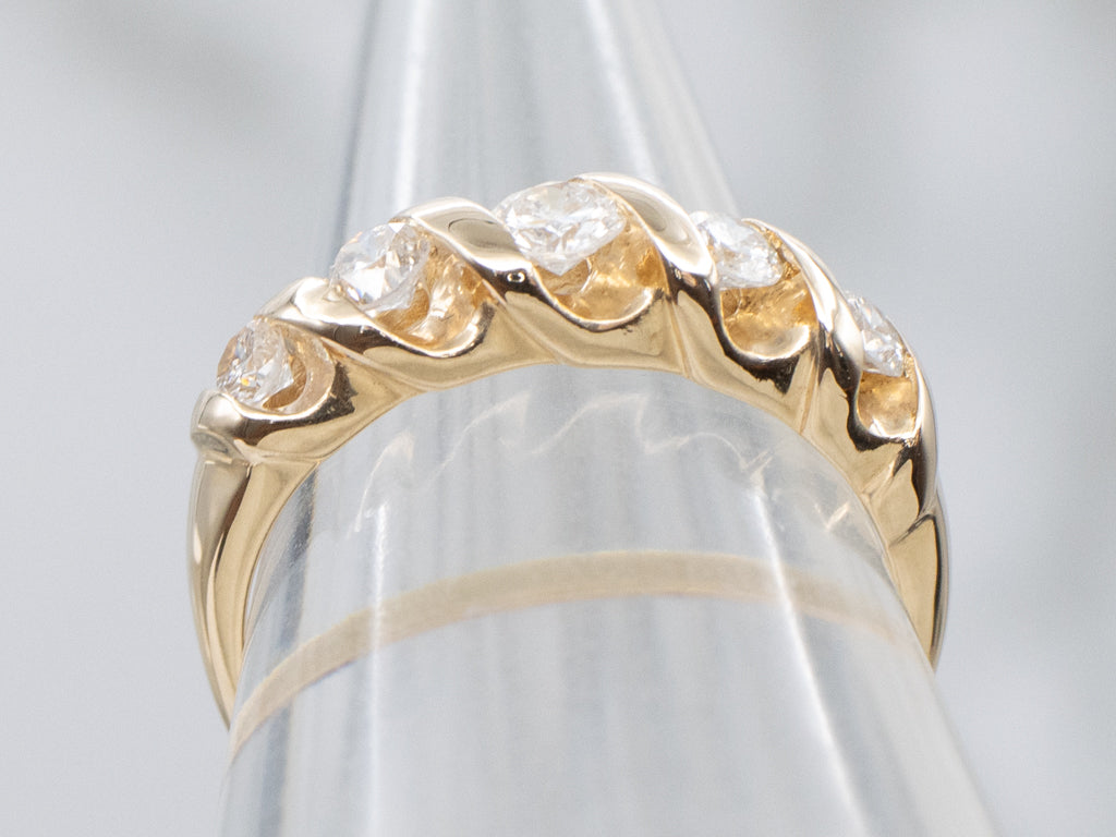 Twisting Gold Graduated Diamond Band