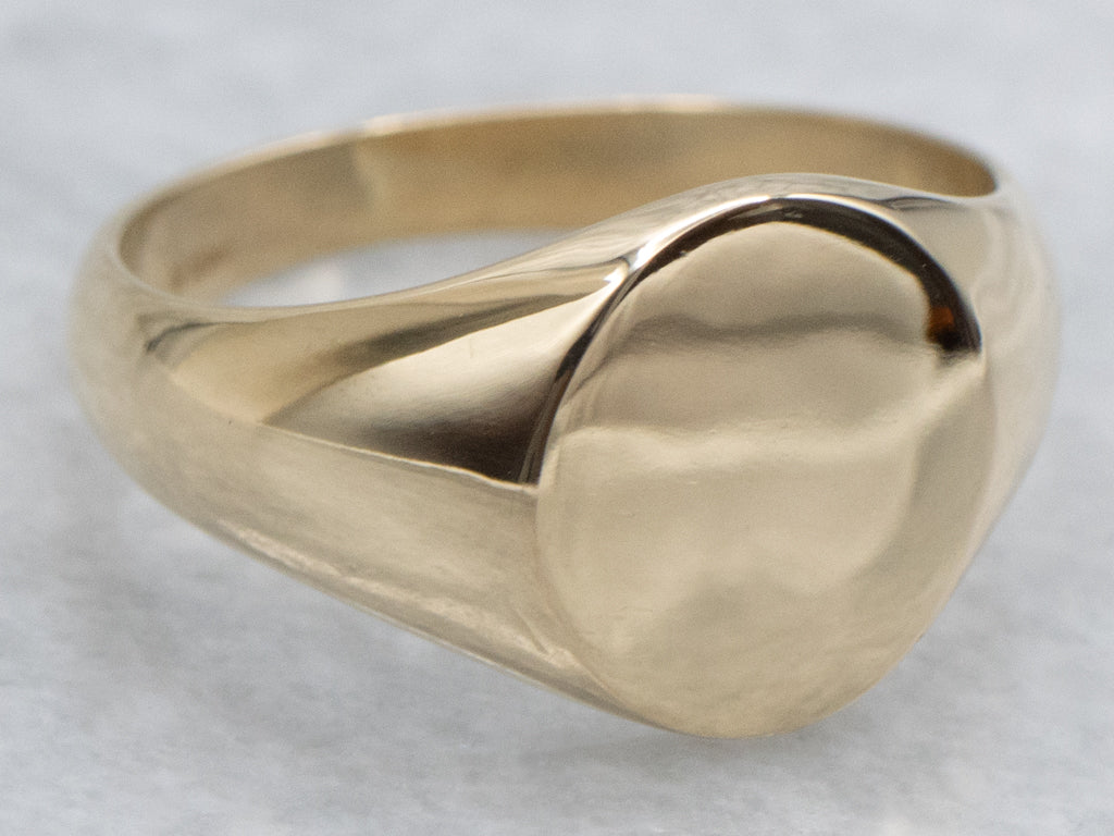 Plain Oval-Top Yellow Gold Signet Ring