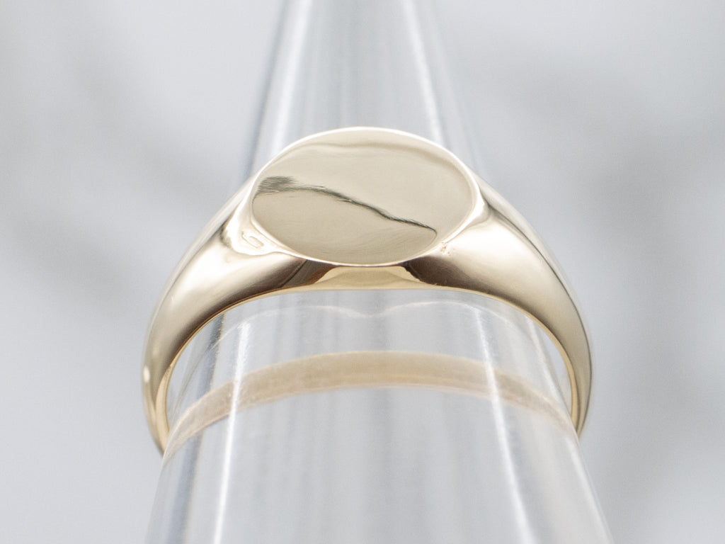 Plain Oval-Top Yellow Gold Signet Ring