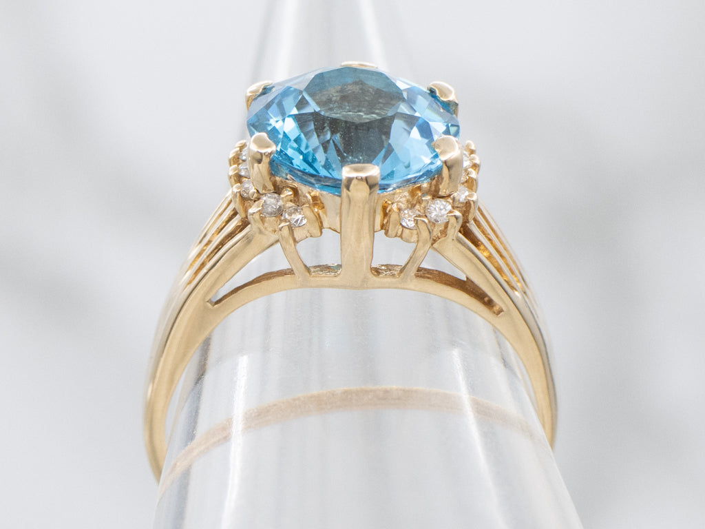 Swiss Blue Topaz and Diamond Gold Split Shank Ring