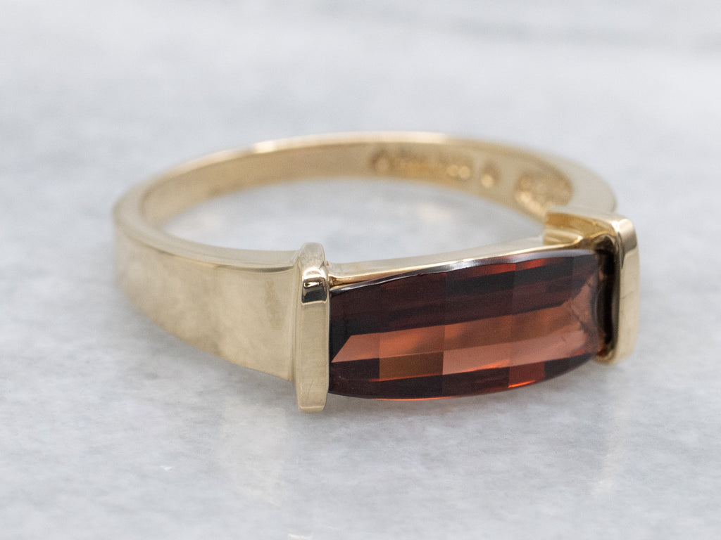 Sleek East-To-West Modern Garnet and Gold Ring