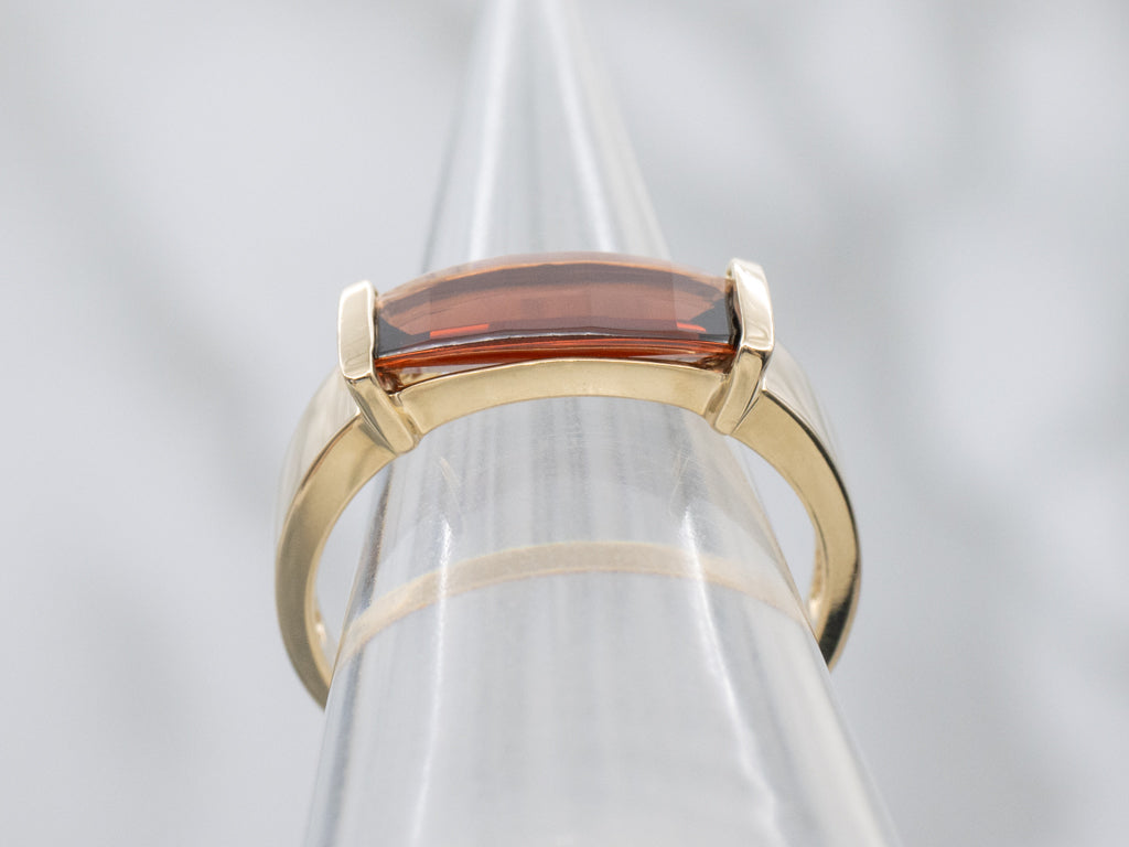 Sleek East-To-West Modern Garnet and Gold Ring