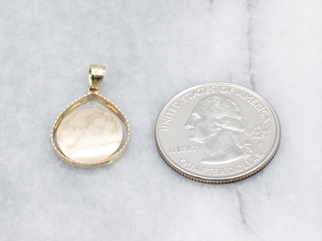 Yellow Gold Teardrop Pendant with Open Disc Center