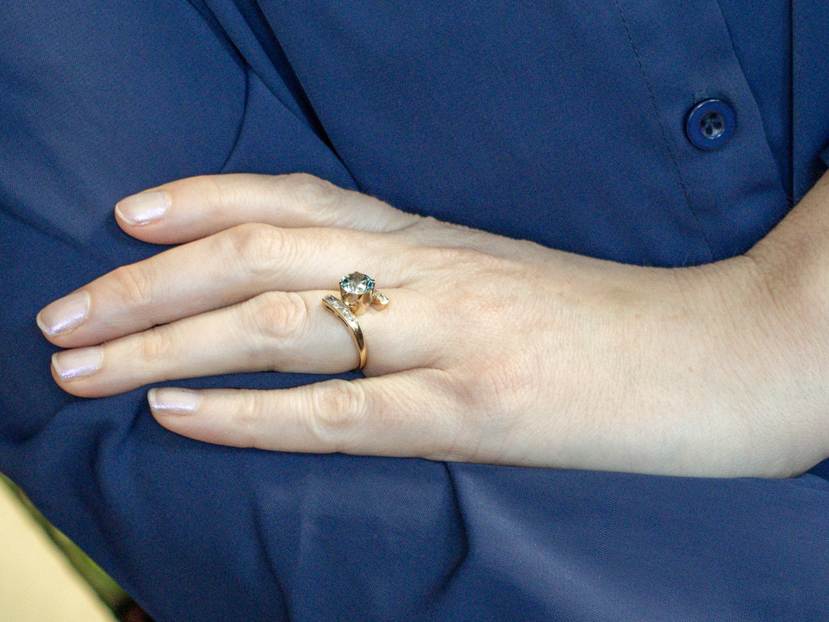 Round Cut Blue Zircon and Diamond Gold Bypass Ring