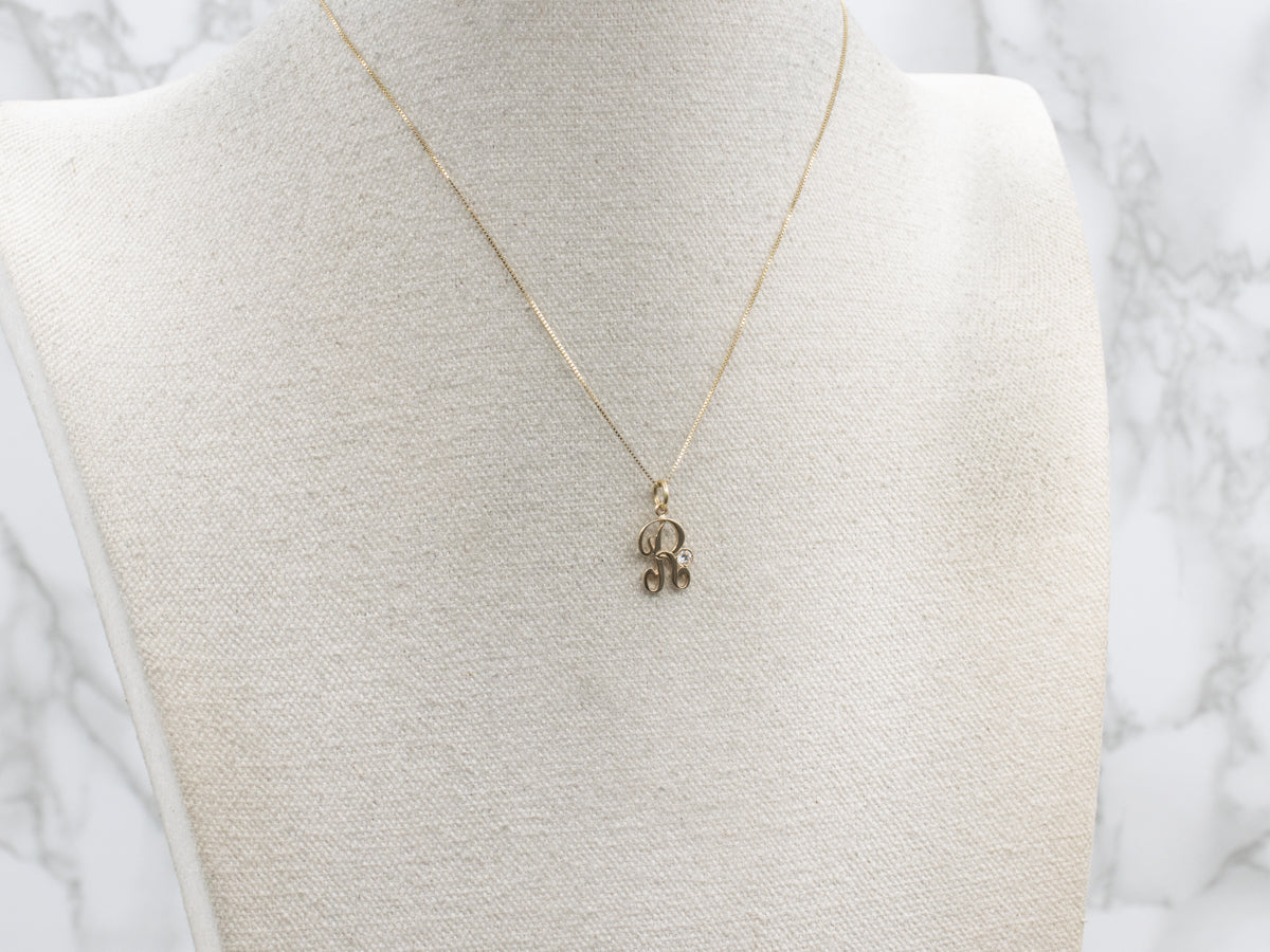 Diamond Cursive Initial "R" Yellow Gold Pendant
