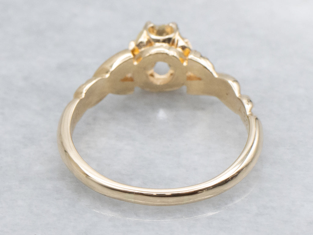 Buttercup-Set Diamond Solitaire Engagement Ring with Twisted Shoulders
