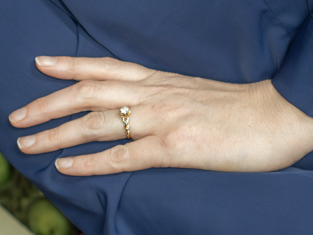 Buttercup-Set Diamond Solitaire Engagement Ring with Twisted Shoulders