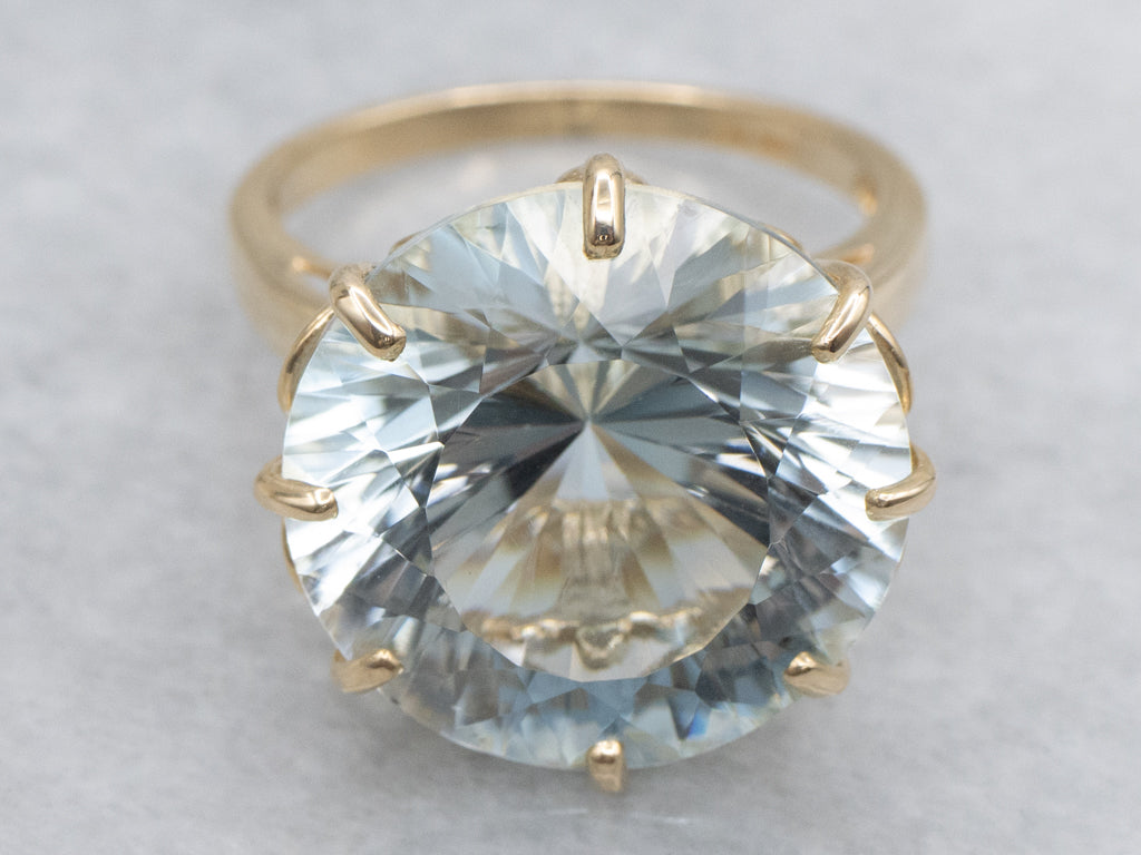 Stunning Round-Cut Blue Topaz and Gold Cocktail Ring