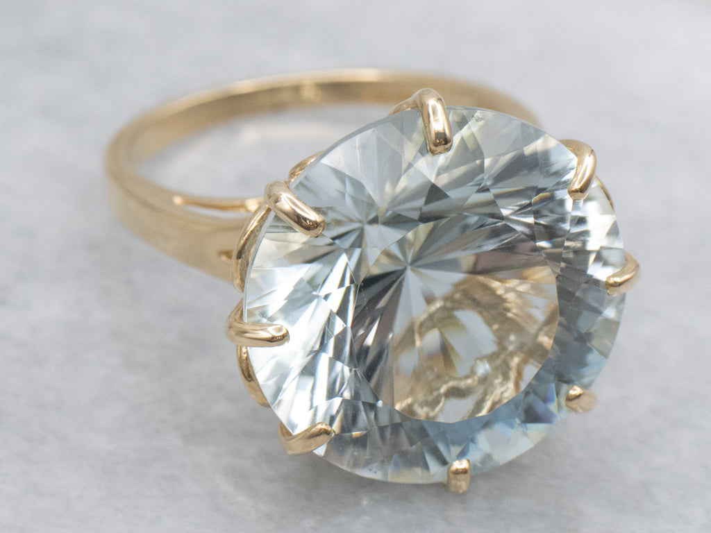 Stunning Round-Cut Blue Topaz and Gold Cocktail Ring