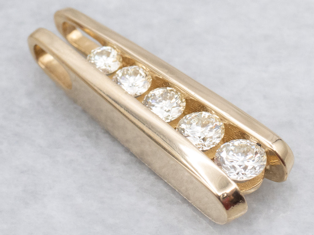 Tension-Set Diamond and Gold Pendant with Hidden Bail