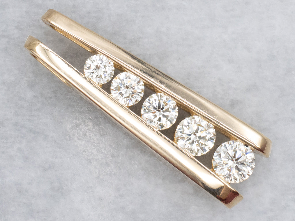 Tension-Set Diamond and Gold Pendant with Hidden Bail
