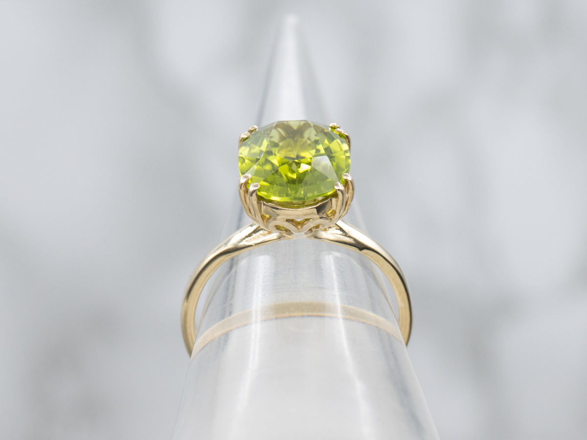 Oval-Cut Peridot Yellow Gold Solitaire Ring
