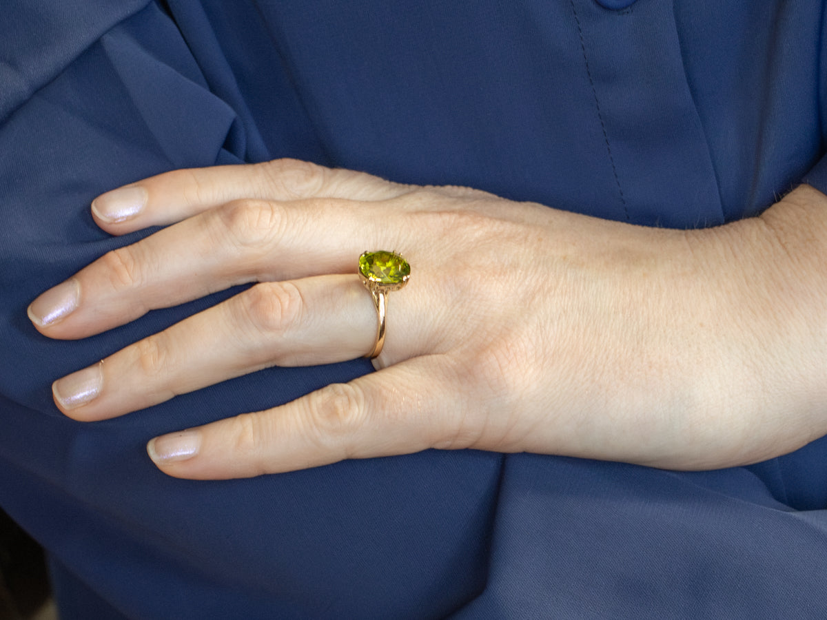 Oval-Cut Peridot Yellow Gold Solitaire Ring