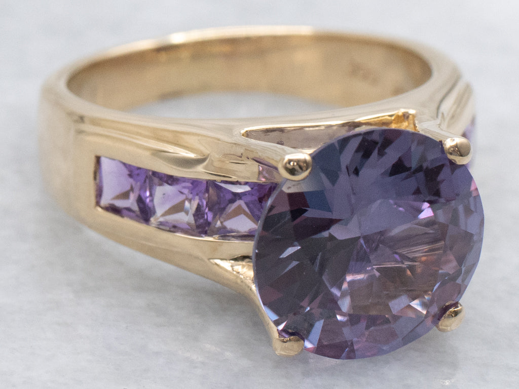 Synthetic Alexandrite Yellow Gold Cocktail Ring with Channel Set Amethyst Accents