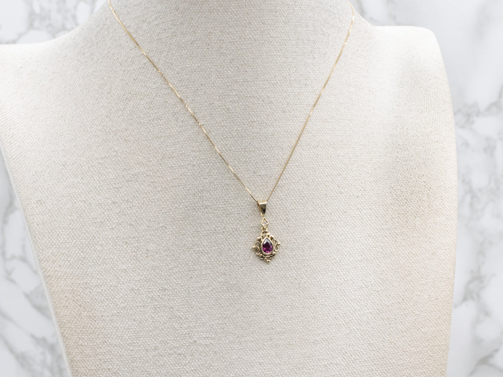Rhodolite Garnet and Diamond Yellow Gold Pendant