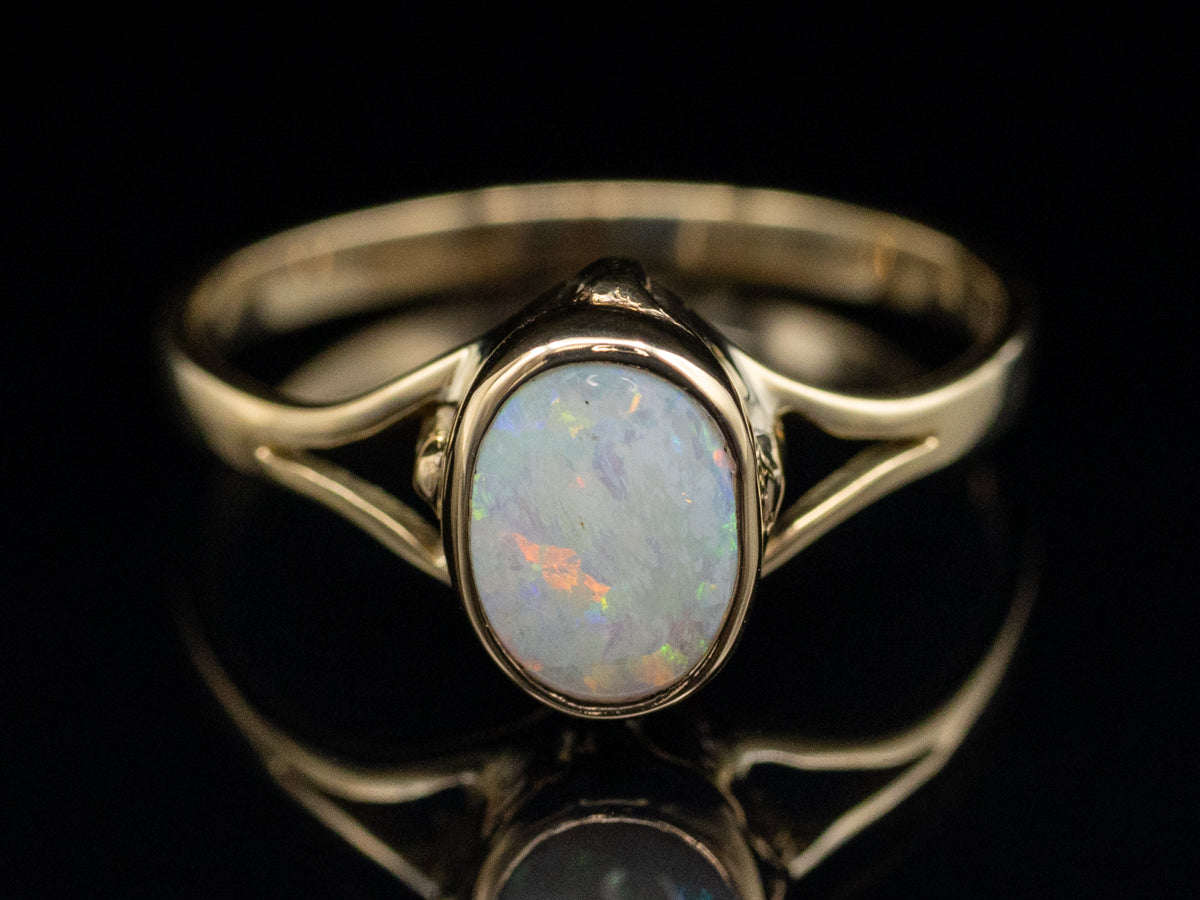 Bezel-Set Opal and Gold Solitaire Ring with Split Shank
