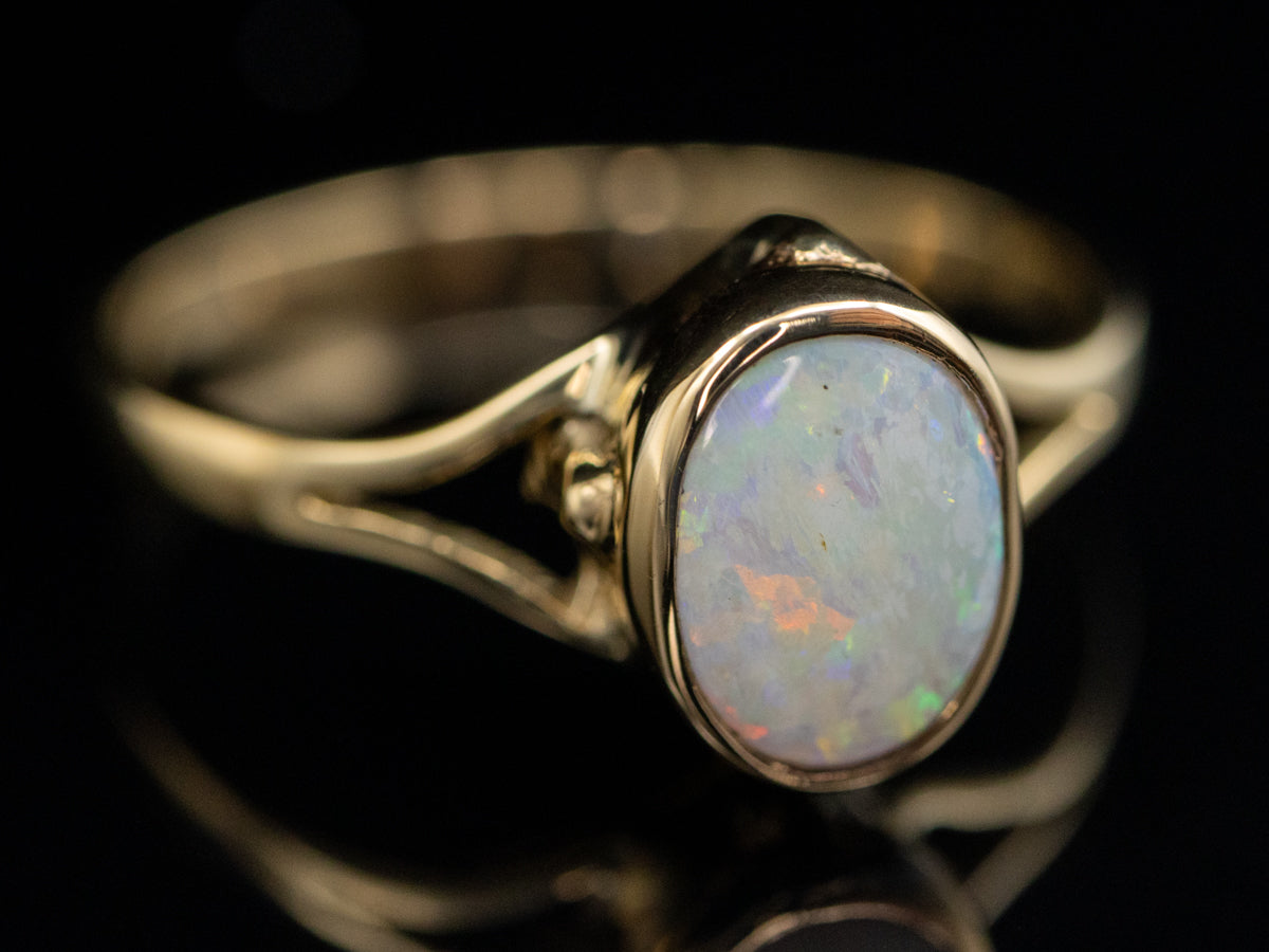 Bezel-Set Opal and Gold Solitaire Ring with Split Shank
