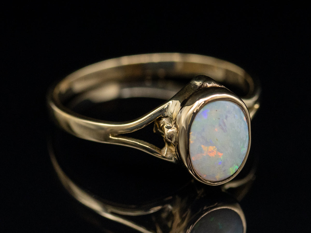 Bezel-Set Opal and Gold Solitaire Ring with Split Shank