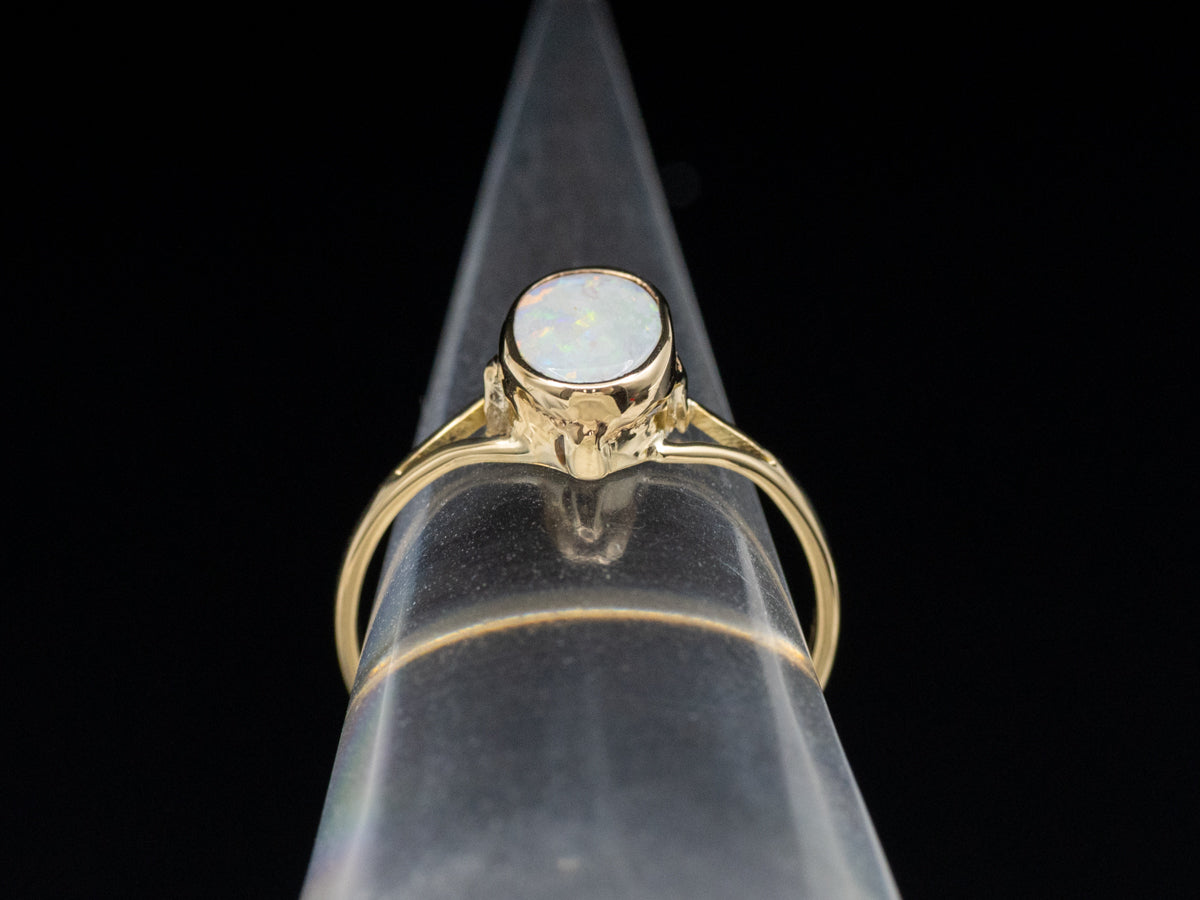 Bezel-Set Opal and Gold Solitaire Ring with Split Shank
