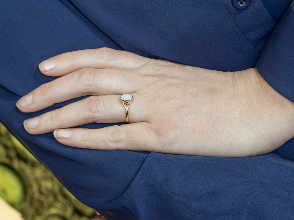 Bezel-Set Opal and Gold Solitaire Ring with Split Shank