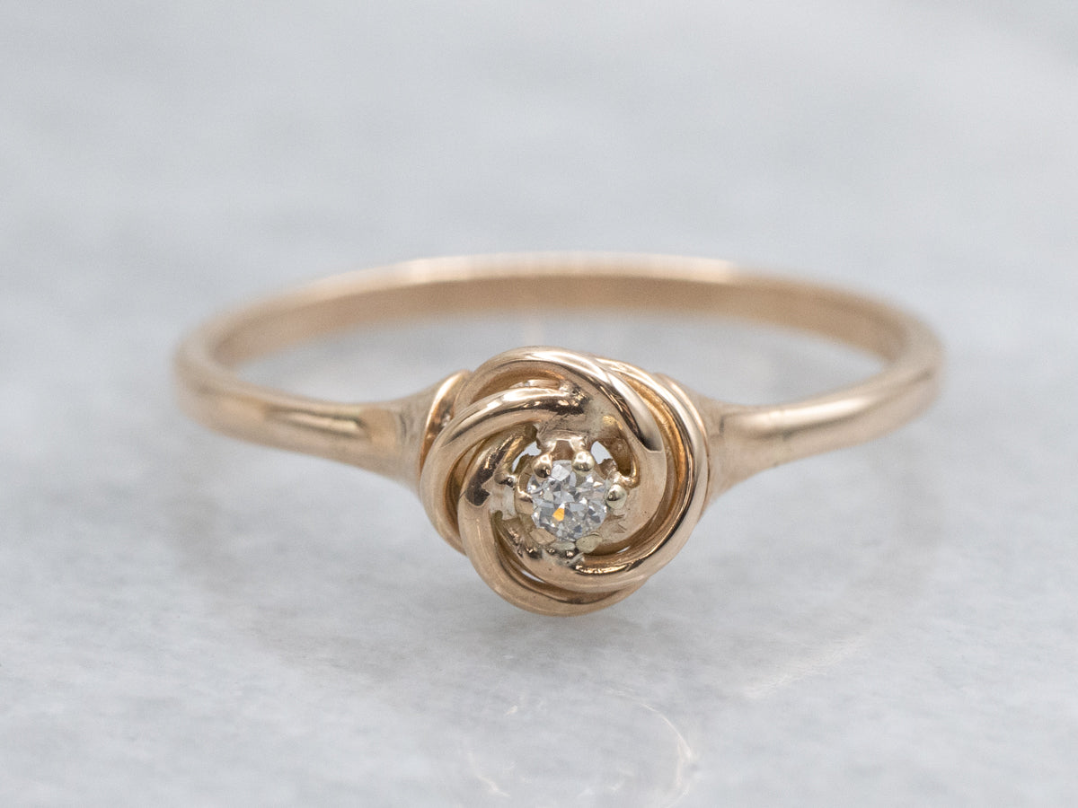 Twisting Rose Gold Diamond Solitaire Ring