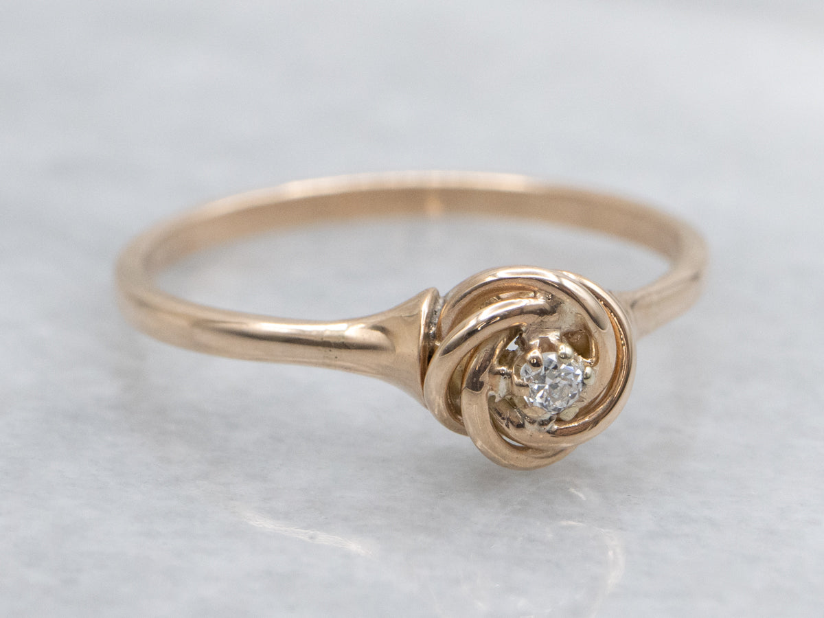 Twisting Rose Gold Diamond Solitaire Ring
