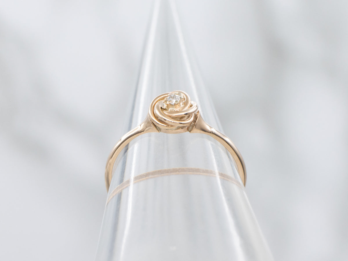 Twisting Rose Gold Diamond Solitaire Ring