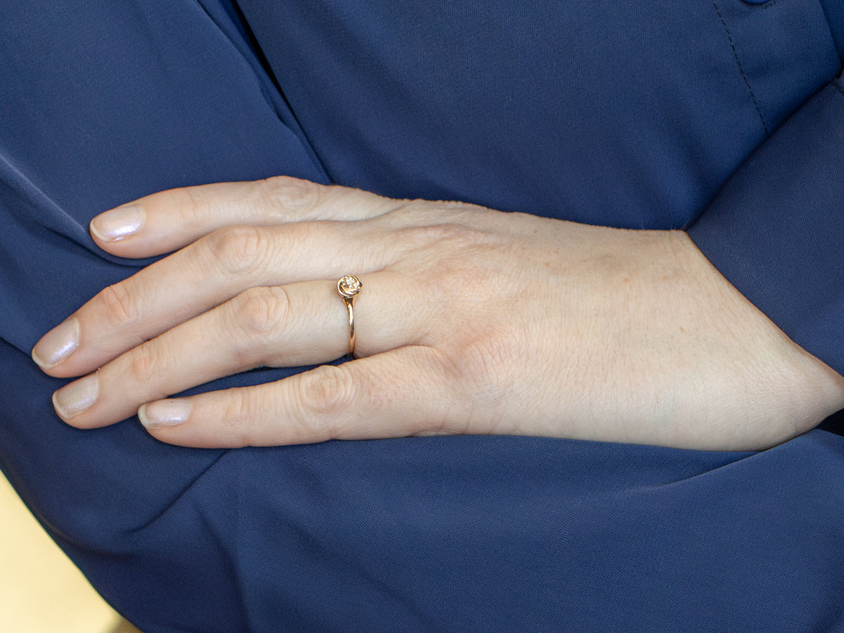 Twisting Rose Gold Diamond Solitaire Ring