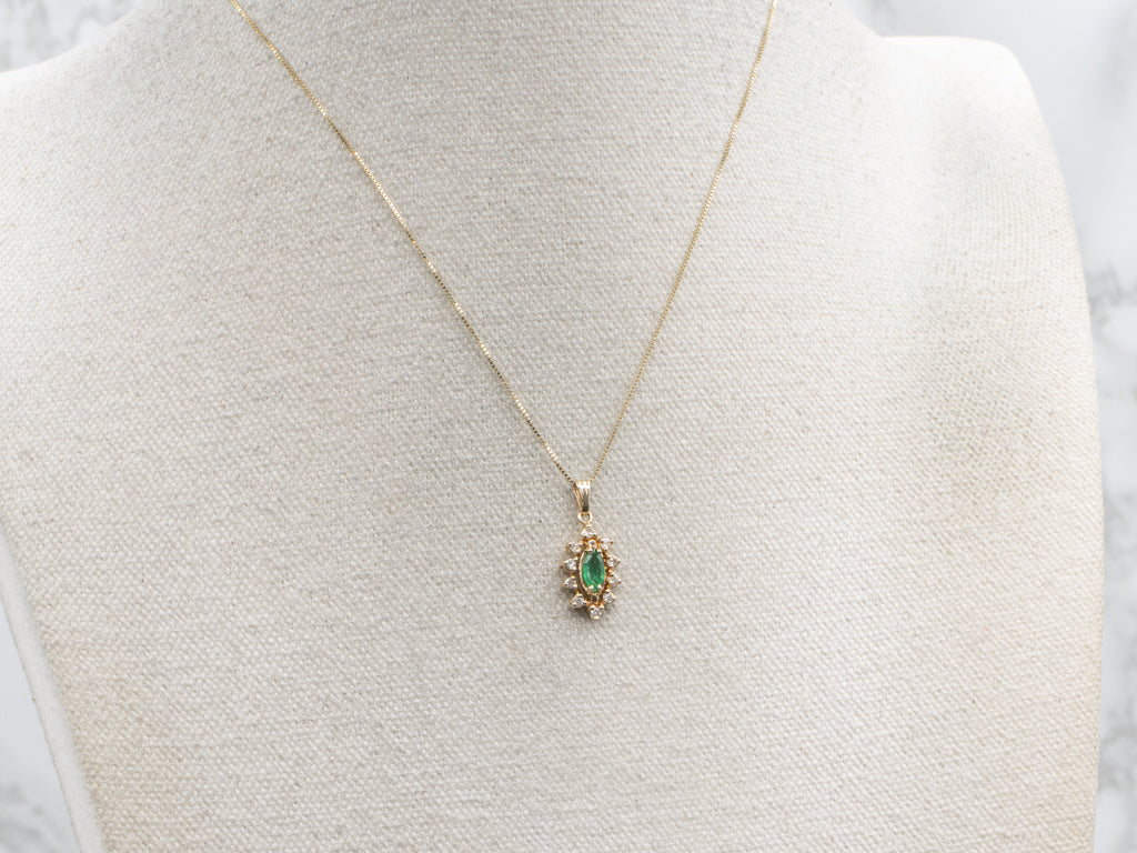 Marquise-Emerald and Diamond Halo Gold Pendant