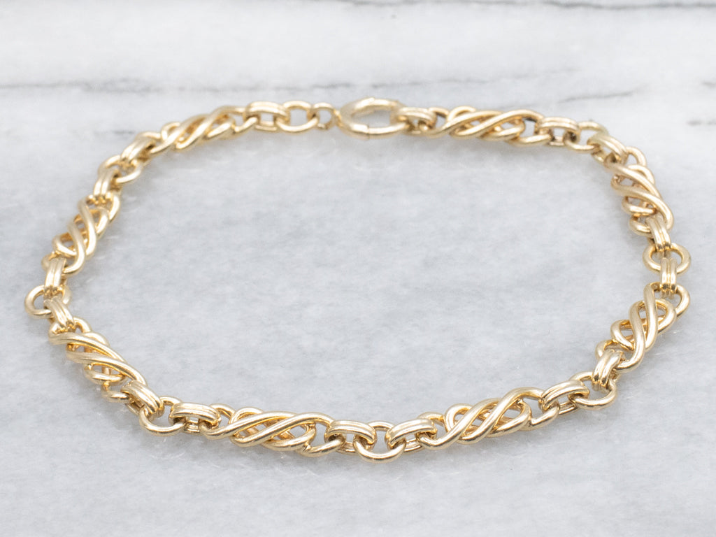 Yellow Gold Twisting Link Chain Bracelet