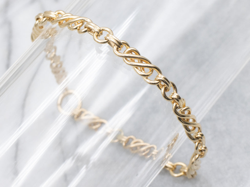 Yellow Gold Twisting Link Chain Bracelet