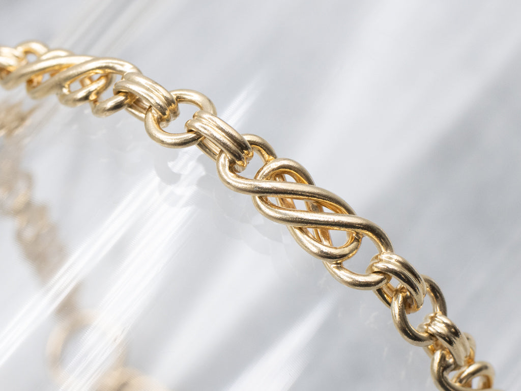 Yellow Gold Twisting Link Chain Bracelet