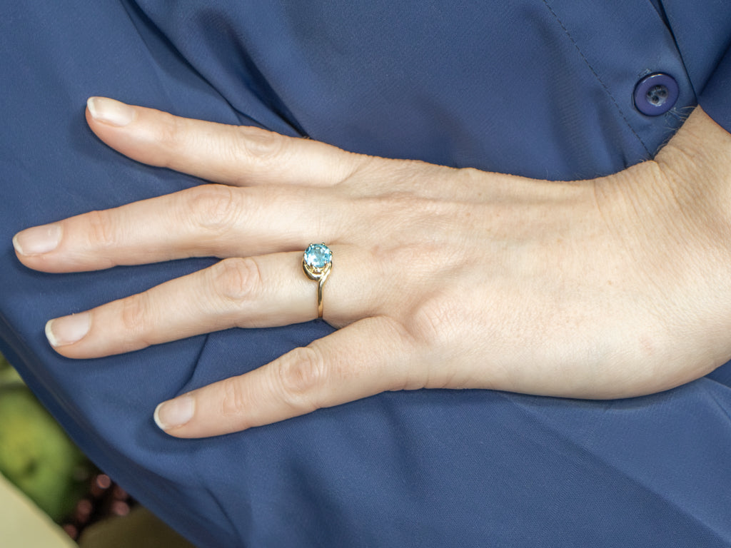 Bright Blue Topaz Yellow Gold Bypass Ring