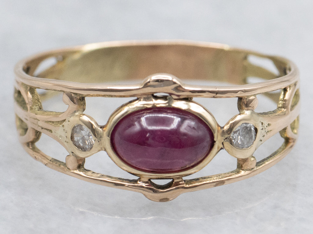 East-West Set Ruby Cabochon and Diamond Gold Ring