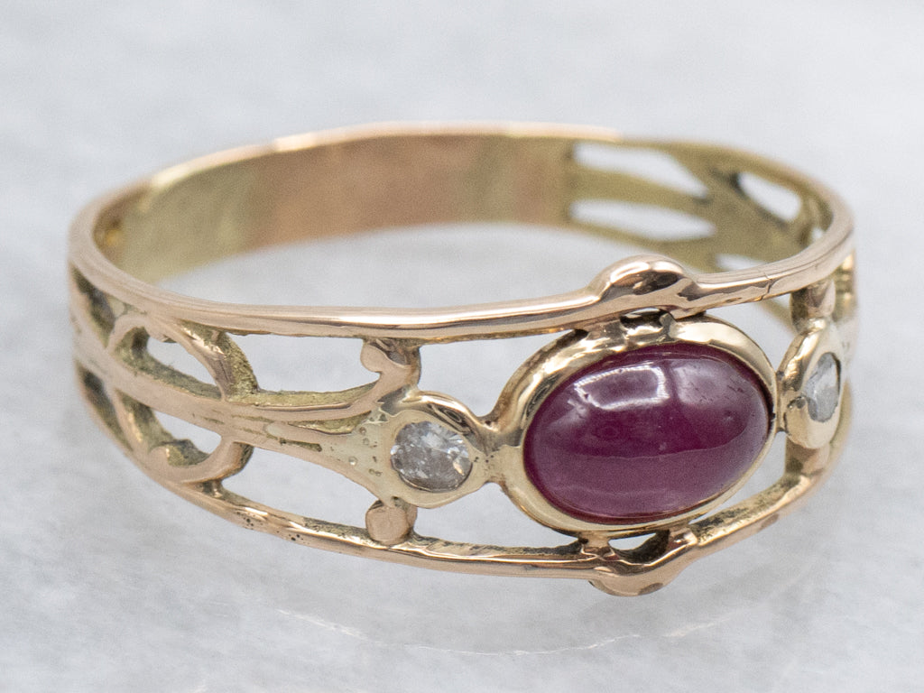 East-West Set Ruby Cabochon and Diamond Gold Ring