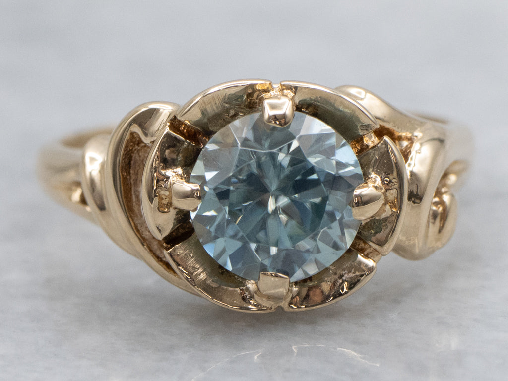 Blue Zircon Solitaire in Vintage Scrolling Gold Ring