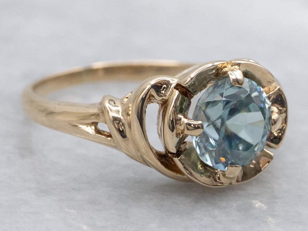 Blue Zircon Solitaire in Vintage Scrolling Gold Ring