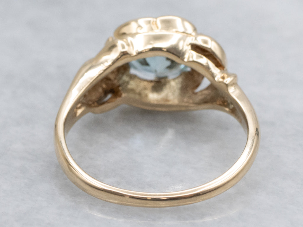 Blue Zircon Solitaire in Vintage Scrolling Gold Ring