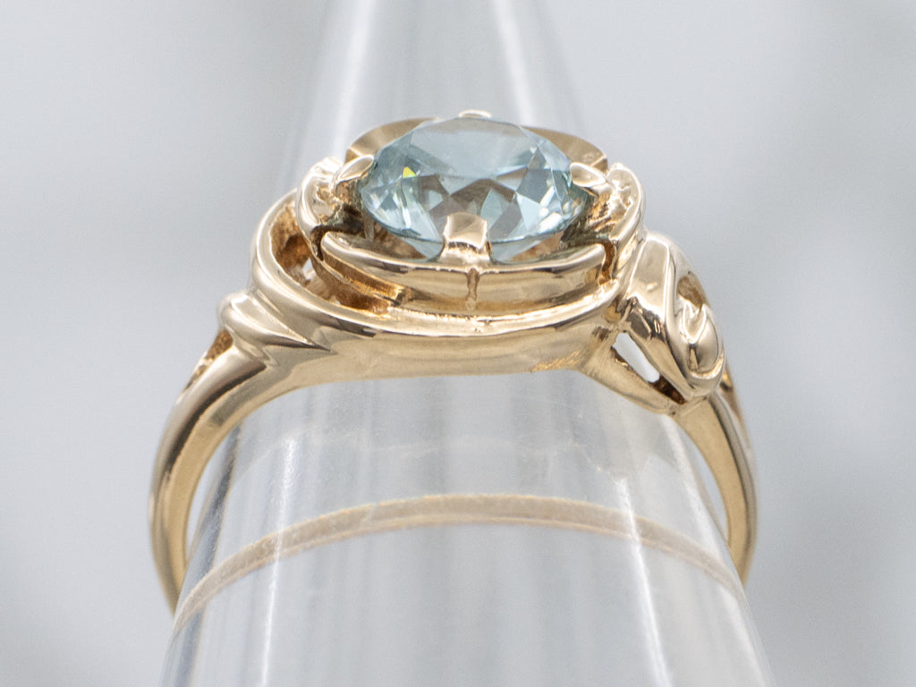 Blue Zircon Solitaire in Vintage Scrolling Gold Ring