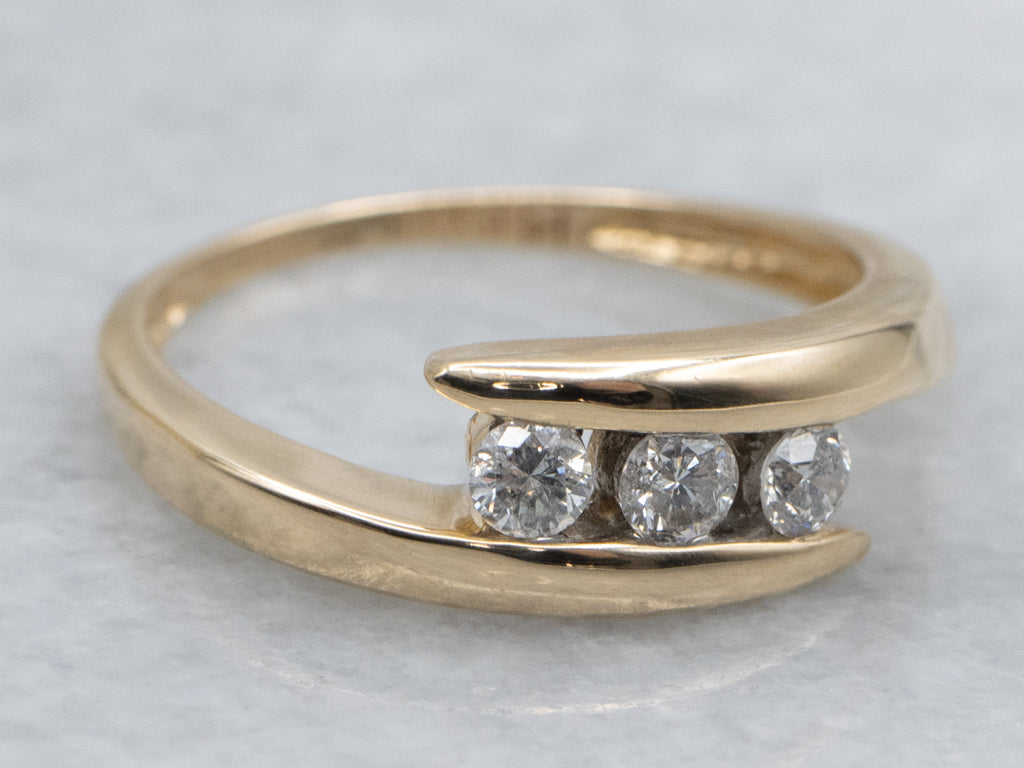 Sleek Yellow Gold Diamond Bypass Band