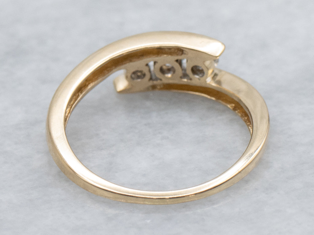 Sleek Yellow Gold Diamond Bypass Band