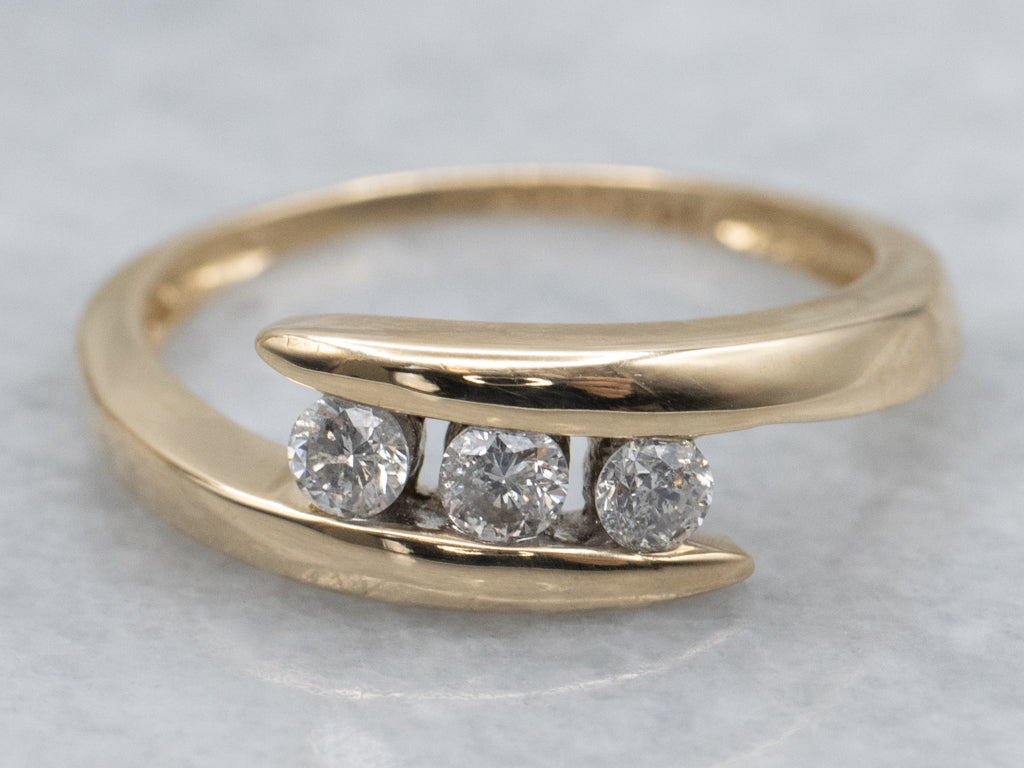 Sleek Yellow Gold Diamond Bypass Band